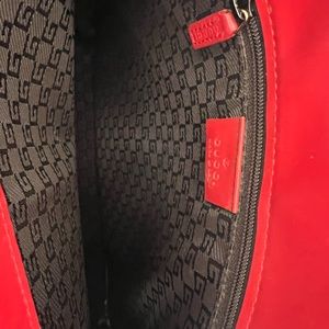Lightly used AUTHENTIC GUCCI RED LEATHER purse.